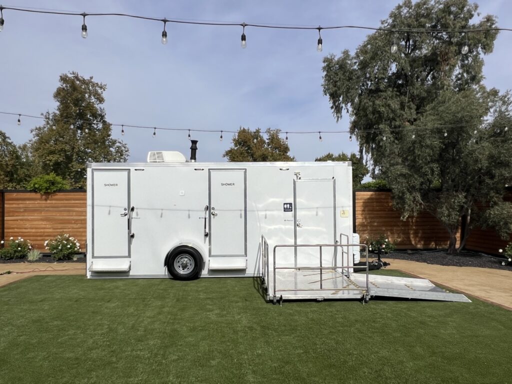 ADA+2 luxury restroom trailer rental at a wedding.