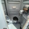 Deluxe sink porta potty rental unit interior.
