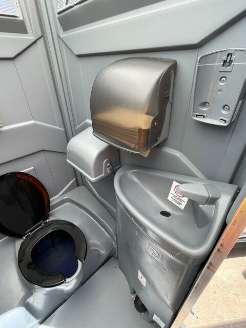 Deluxe Sink Porta Potty interior.