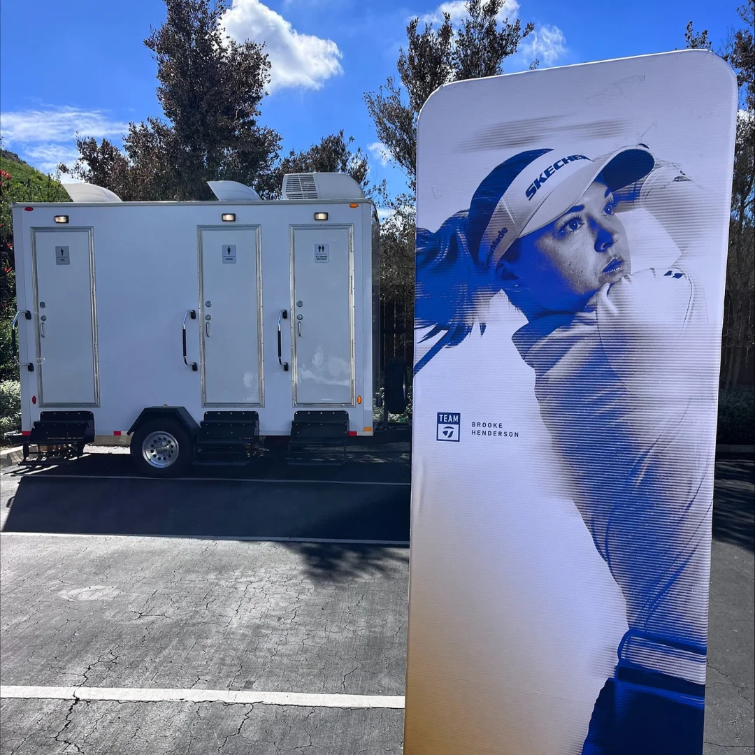 Patriot Portable Restrooms two-stall restroom trailer at a golf event