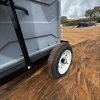 A picture of the wheel on the towable porta potty rental unites.
