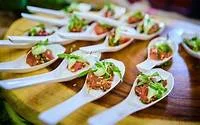 Catered appetizers served on tasting spoons