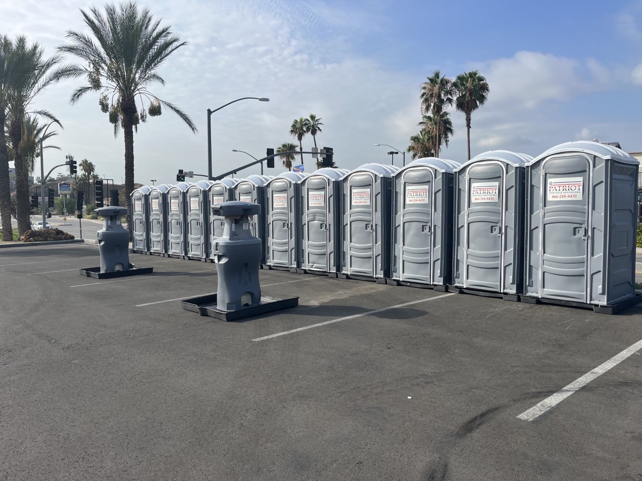 A row of our porta potty rentals at a street fair in San Diego, CA.