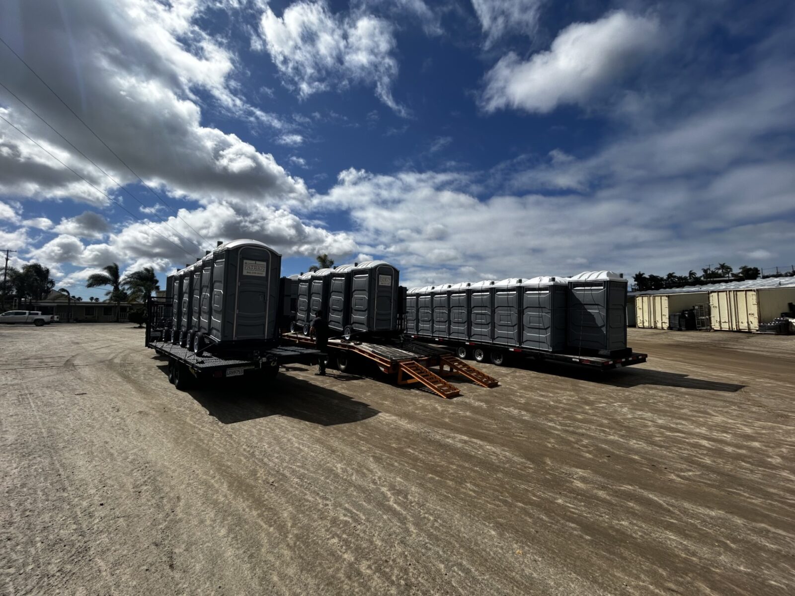 Patriot portable toilets staged on an agricultural site